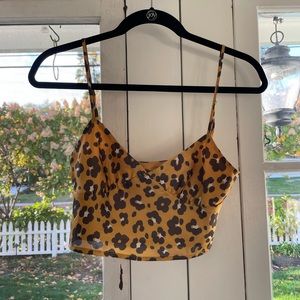 Cheetah print cropped tank top.